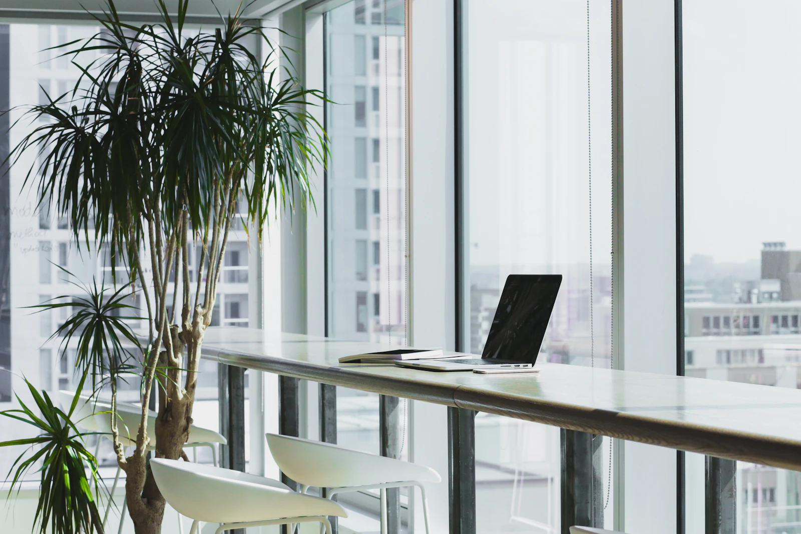 A corporate office floor with staff at workstations in Dubai