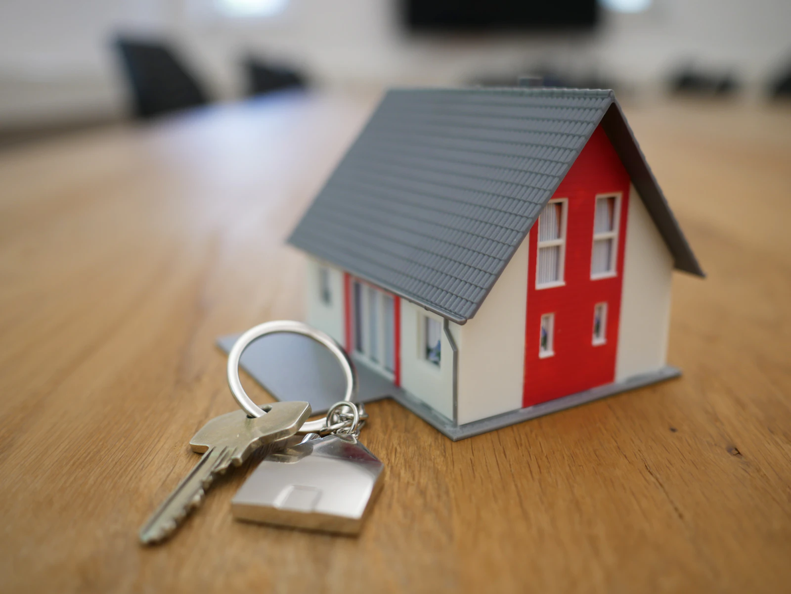 A real estate agent showing a property to clients in Dubai